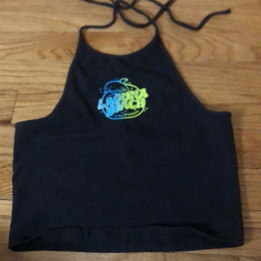 cropped black halter tank top with some graphics on it